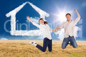 Composite image of couple jumping and holding hands