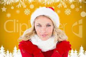 Composite image of happy festive blonde