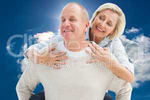 Composite image of happy mature man giving piggy back to partner