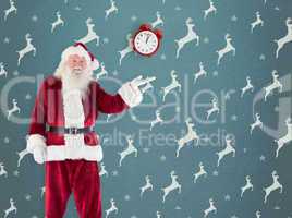 Composite image of santa shows something to camera