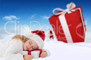 Composite image of cute girl with gift