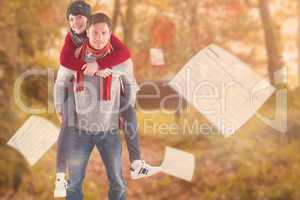 Composite image of man giving girlfriend piggy back