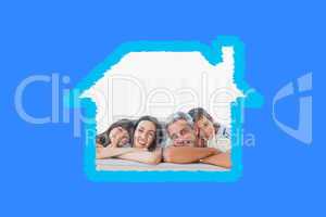 Composite image of beautiful family in sitting room smiling