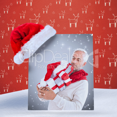 Composite image of happy festive man with gifts