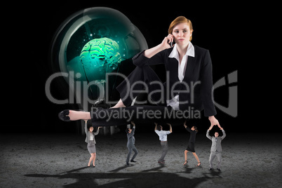 Composite image of business people supporting boss