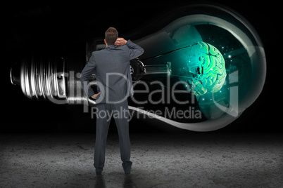 Composite image of thinking businessman