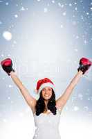 Woman wearing red boxing gloves