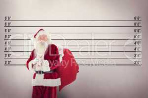 Composite image of santa carries his red bag