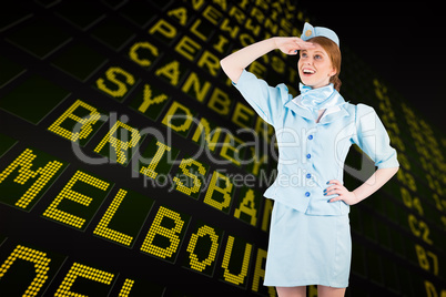 Composite image of pretty air hostess looking up