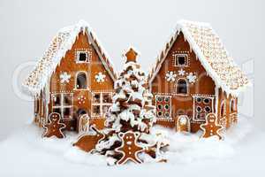 The hand-made eatable gingerbread houses and New Year Tree with