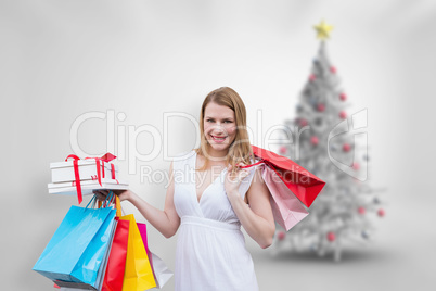 Composite image of woman with shopping bags Composite image of woman with shopping bags