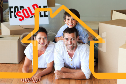 Composite image of family in their new house lying on floor with