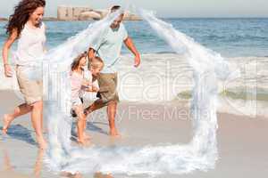 Composite image of family running on the beach