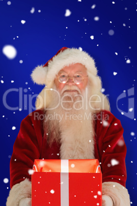 Composite image of father christmas offering a magical christmas