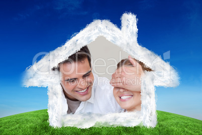 Composite image of man covering the eyes of his girlfriend while