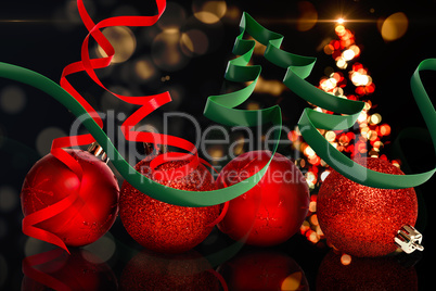 Composite image of ribbon in shape of christmas tree