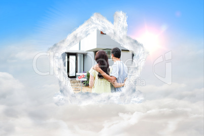 Composite image of newlyweds with their new house