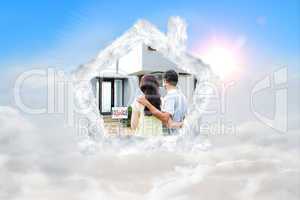 Composite image of newlyweds with their new house