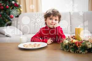 Composite image of festive little boy having milk and cookies