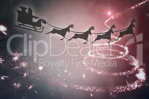 Composite image of silhouette of santa claus and reindeer