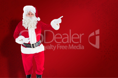 Composite image of portrait of santa claus doing gesture