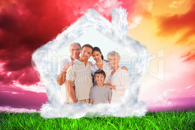 Composite image of portrait of a smiling family at the beach