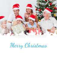 Composite image of little girl opening christmas present