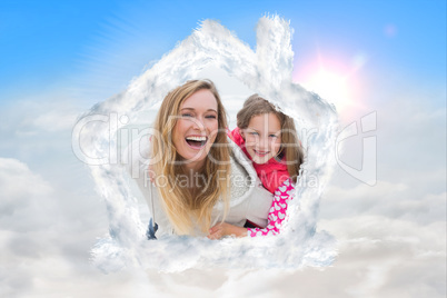 Composite image of couple piggybacking kids at the beach