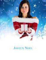 Composite image of pretty girl in santa outfit holding gift