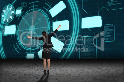 Composite image of excited businesswoman cheering