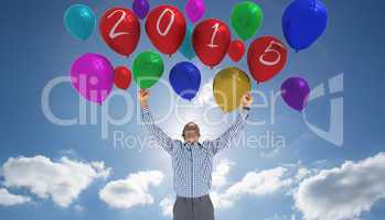 Composite image of excited businessman cheering