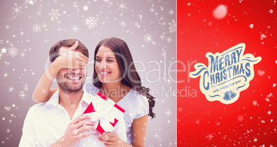 Composite image of woman surprising boyfriend with gift