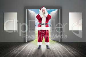 Composite image of santa is shocked to camera