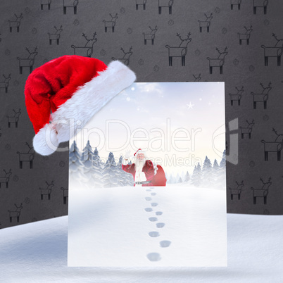 Composite image of santa delivery presents to village