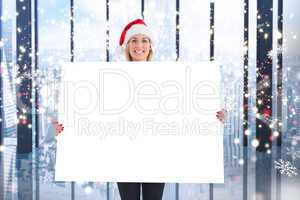 Composite image of festive blonde showing poster