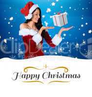 Composite image of pretty girl presenting in santa outfit