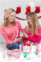 Composite image of festive mother and daughter with many gifts