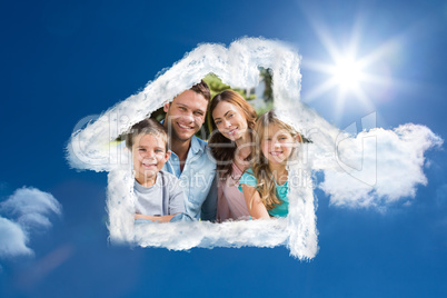 Composite image of family enjoying the sun