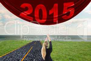 Composite image of businesswoman pulling a chain