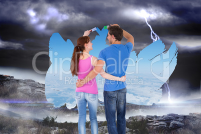 Composite image of couple both about to paint