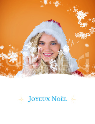 Composite image of pretty girl in santa outfit pointing