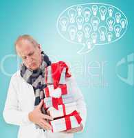 Festive man holding christmas gifts