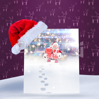 Composite image of santa hat on poster