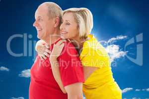 Composite image of happy mature couple hugging and smiling