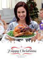 Composite image of woman showing to the camera christmas turkey