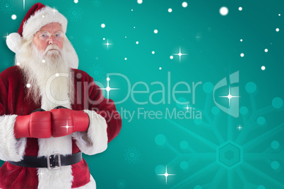 Composite image of santa claus wears boxing gloves