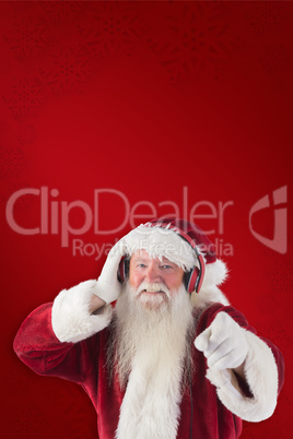 Composite image of santa is listening some music