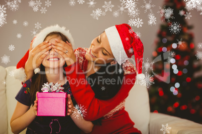 Composite image of mother surprising her daughter with christmas