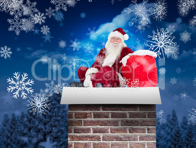 Composite image of santa sits next to his bag