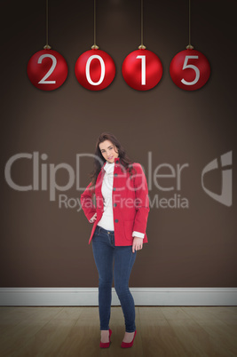 Composite image of beauty brunette posing in red coat and heels